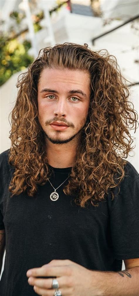 man curly hair long hair